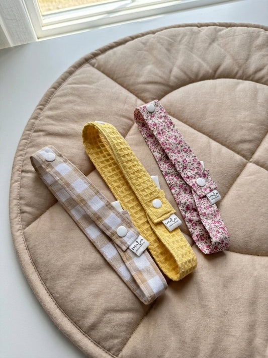 Cinta cuelga juguetes