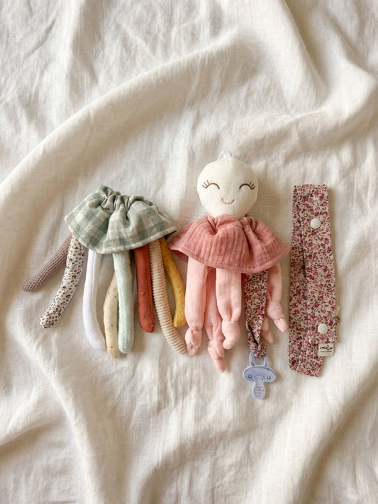 Pack Nonito sensorial y doudou rosa + Cinta cuelga juguetes