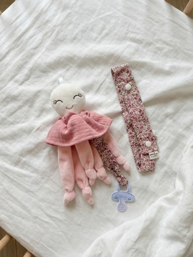 Nonito doudou rosa + cinta cuelga juguetes