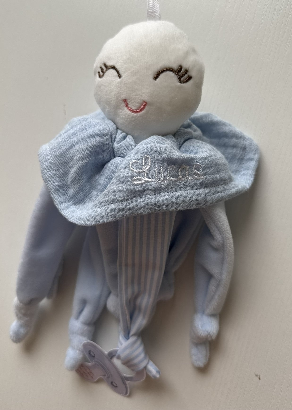 Nonito doudou azul + Cinta cuelga juguetes